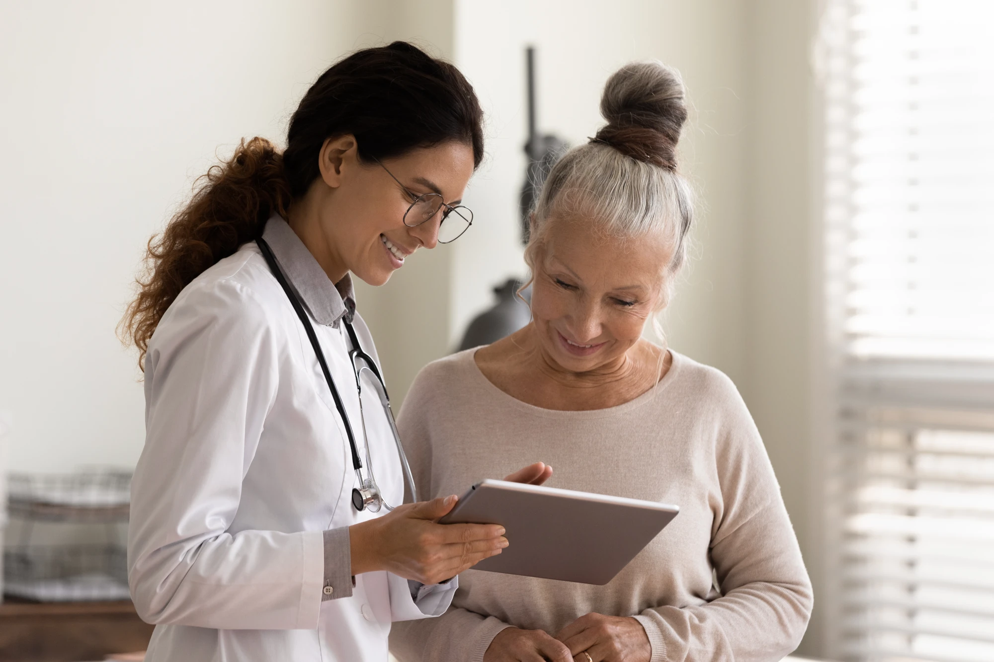 Patient asking questions during a primary care visit in San Diego.