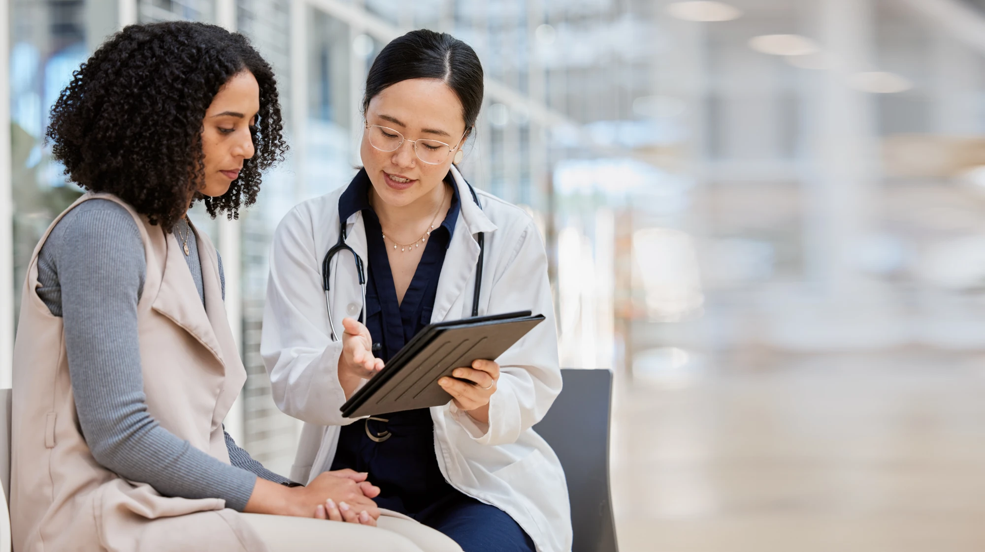 Healthtopia medical team member providing primary care to a patient in San Diego.